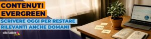 Scrivania con computer e quaderno che analizzano grafici